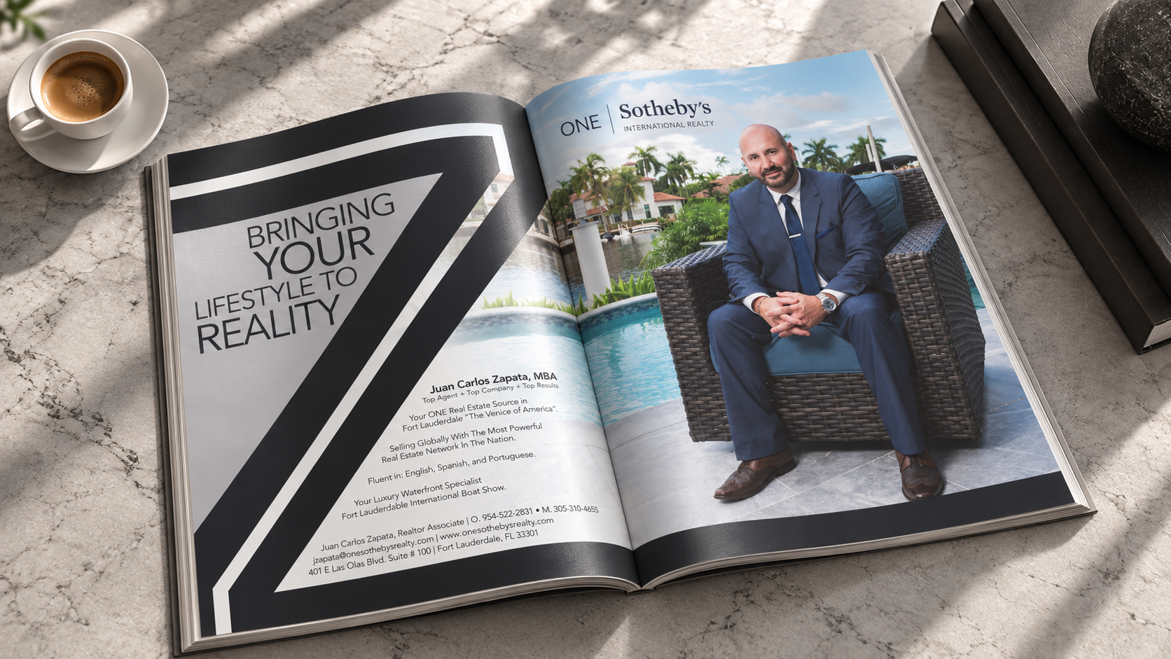 Open magazine on a stone table displaying the ONE Sotheby’s two-page advertisement